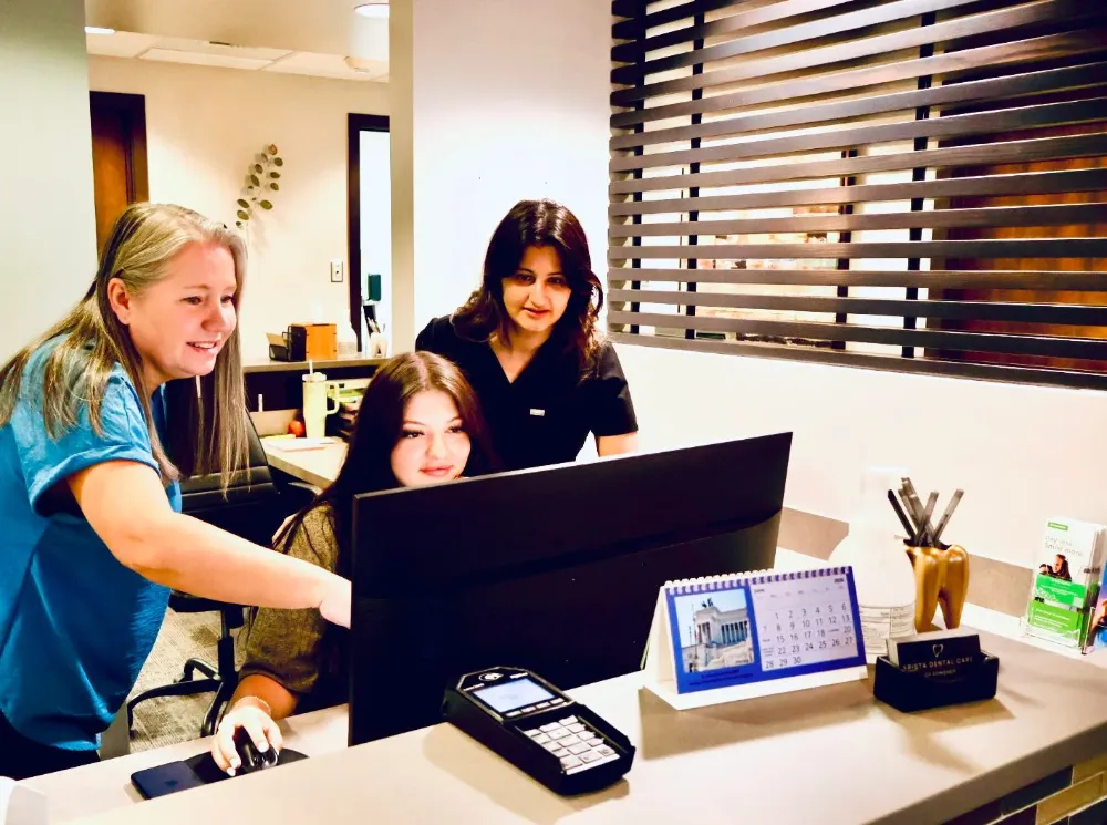 Arista Dental Care team members at the front desk